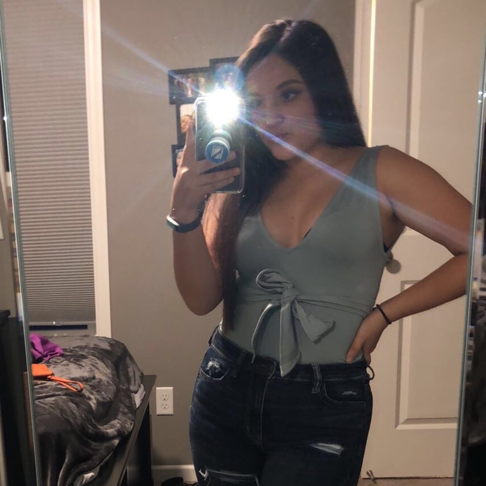 Teal body suit